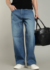 Mid-Wash Baggy Fit Denim Jeans for Men - Color Hunt